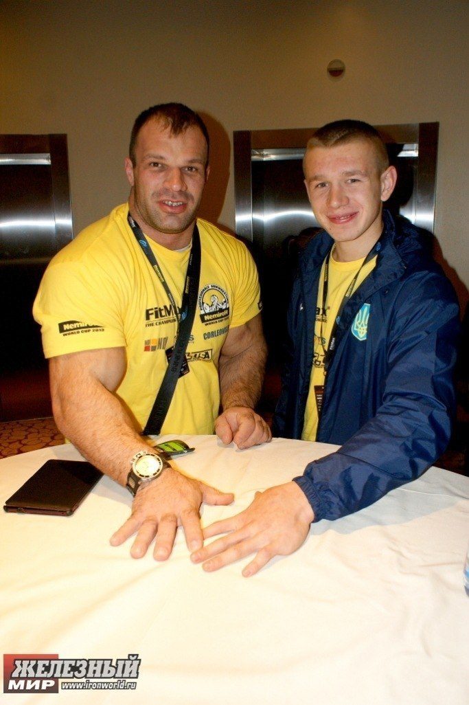 Denis Cyplenkov vs. Oleg Zhokh - hand size comparison 3 │ Photo Source: Andrey Sharkoff - IronWorld.ru