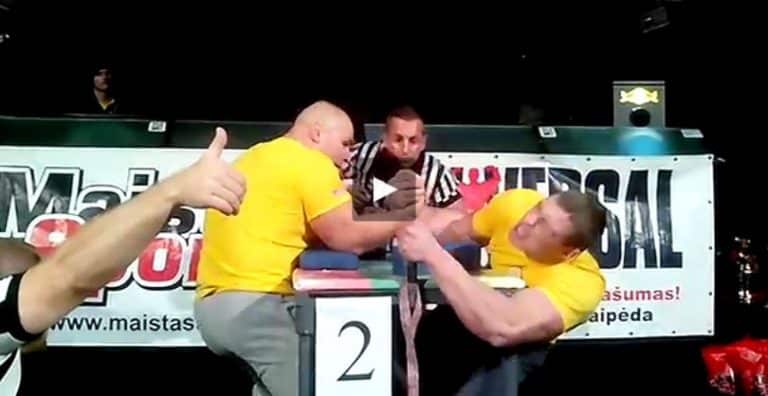 Normunds Tomsons vs. Dinas Petkus - UNIVERSAL Armwrestling Cup 2014 │ Capture by XSportNews from the video